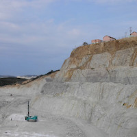 Drilling open pit bench at Songjiagou mine